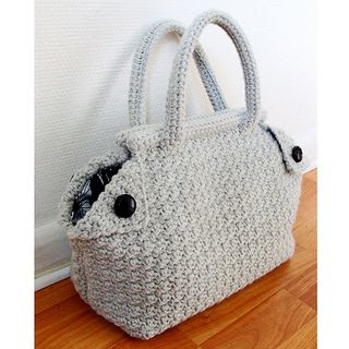 Free Crochet Bag pattern.  Wow!  I really like this bag.  The pattern includes detailed instructions, including how to make and attach the lining.