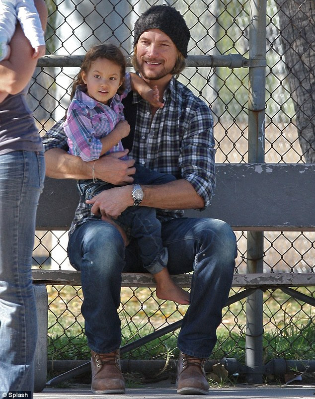 Acrimonious: Her split from Gabriel Aubry, pictured with their daughter Nahla, made headlines when their custody battle turned sour