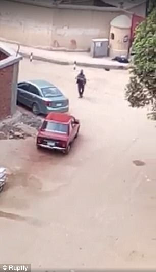 Footage shows what is believed to be the jihadist walking around with an assault rifle