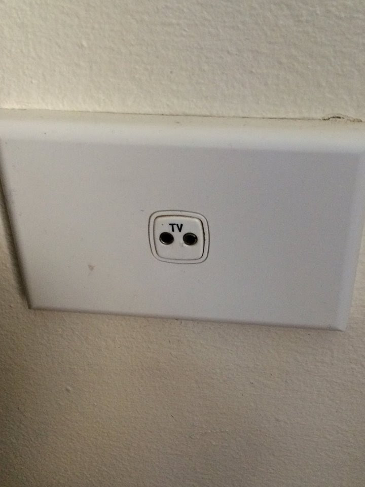 TV wall socket with two holes? Can't find any information online about this  type of socket. : whatisthisthing