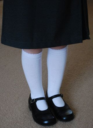 ... of school today she couldn t wait to get into her new school uniform