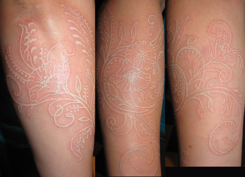 fuckyeahtattoos: this is a white ink tattoo i did on my friend abby. Speck