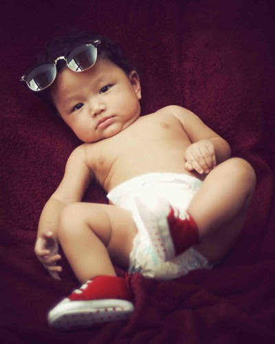 serious Look ...  by Yusaini Photojiwa