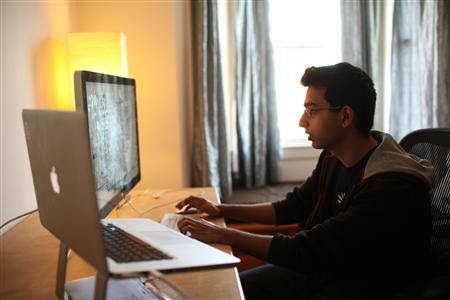 Sahil Lavingia, 19, chief executive officer (CEO) of Gumroad, an online payments company he started, works in his home which doubles as his office in the SOMA neighborhood of San Francisco February 17, 2012. Lavingia, who was born in New York and grew up in places like London, Hong Kong and Singapore, dropped out of the University of Southern California to work at online bulletin board company Pinterest. He also developed the Turntable.fm app for the iPhone.   REUTERS-Robert Galbraith
