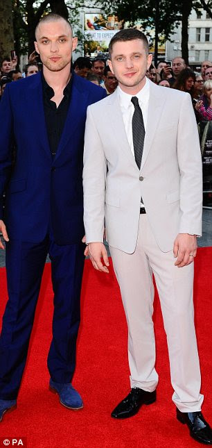 Dapper dude: Plan B, real name Ben Drew, looked great in a grey suit and smart shiny shoes as he prepared to watch his film, which he wrote, directed and penned the soundtrack for. Seen right with Ed Skrein