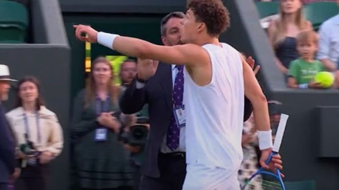 Wimbledon star has to be held back from umpire after match controversially suspended