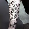 Hahaha Joker Arm Tattoo