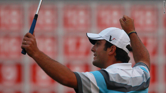 Francesco Molinari celebrates his superb victory after a dramatic head-to-head with Lee Westwood.