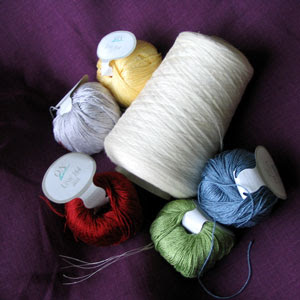 Linen thread for sewing and cotton-viscose for emboidery.