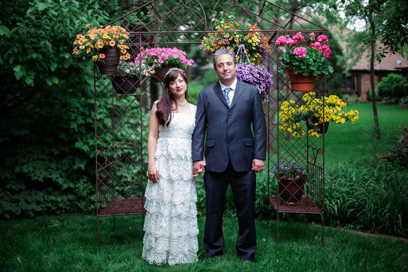 Bride and Groom Portraits following a small summer garden wedding ceremony in Rockford IL by Mindy Joy Photography