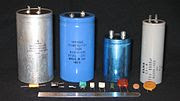 Various Capacitors. The large cylinders are high value electrolytic types