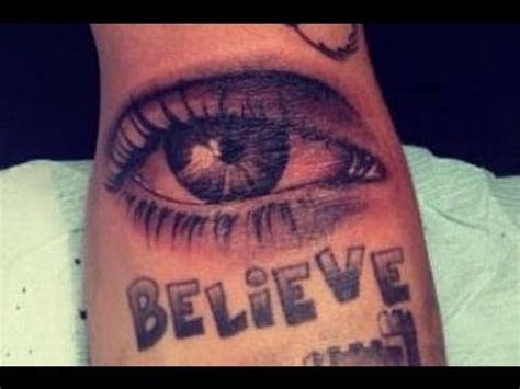 justin biebers    eye tattoo crazy