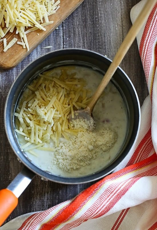 Brussels Sprouts Gratin are the perfect Holiday side dish! The brussels sprouts are roasted until crisp, then topped with a light cheese sauce made with Gruyere and parmesan, and baked until brown and bubbling. If you are as obsessed with brussels sprouts as I am, you'll love these.