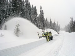 Snowblower shooting snow - SR 20, North Cascades Highway