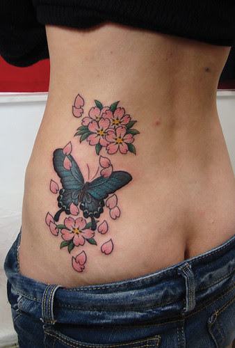 Girl with Tattoo Butterfly and Tattoo Sakura Blossom   