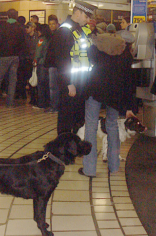 Transport Police at Leicester Square Tube Station with Sniffer Dogs