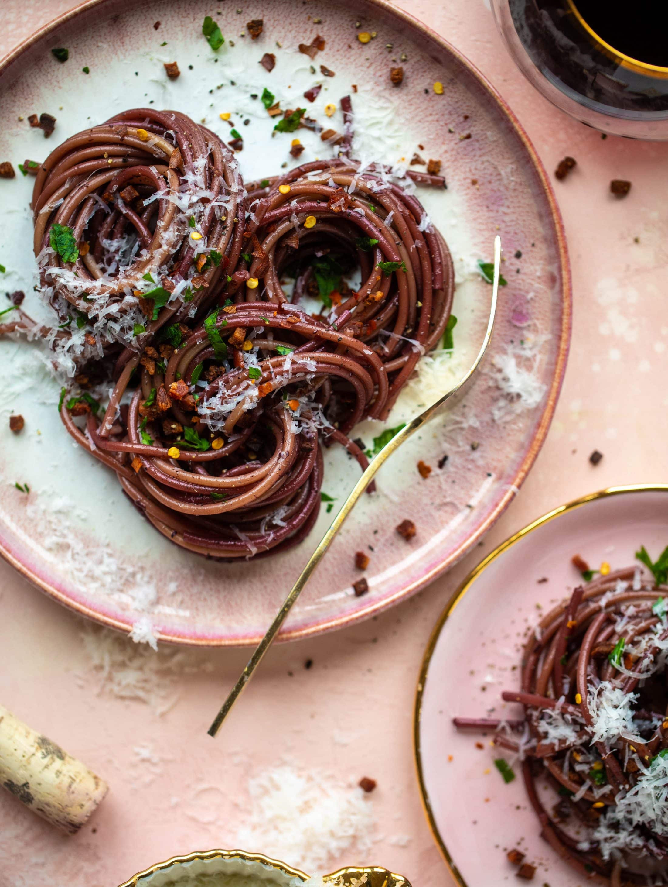 This red wine pasta is an easy, flavorful dinner! Red wine cooked down with garlic and butter until sauce-like. Throw in noodles and you have dinner!
