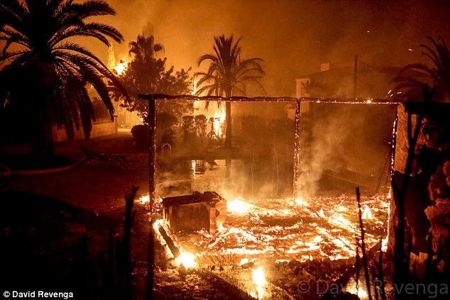 Fire has ripped through buildings in Xabia while thousands have been evacuated from the area