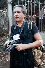 Beggar poet born in captivity in a human zoo by firoze shakir photographerno1