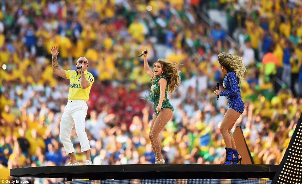 Singer Jennifer Lopez, rapper Pitbull and Brazilian popstar Claudia Leitte bounced around the giant stage as they sang the official World Cup song 'We Are One (Ola Ola)' during the opening ceremony