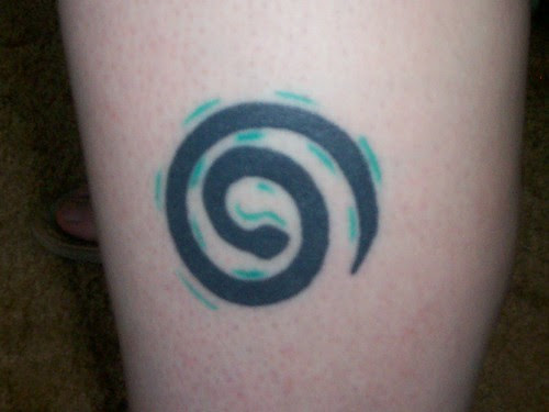 MyMoonsTat · 100_1163 · Spiral Snake Tattoo; ← Oldest photo