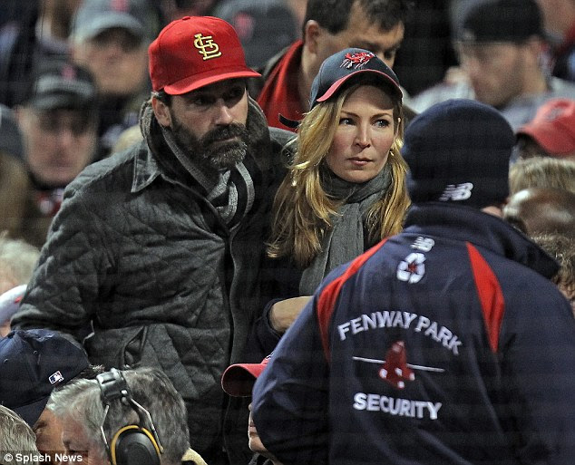 Bearded Jon Hamm silently cheers on the St Louis Cardinals 