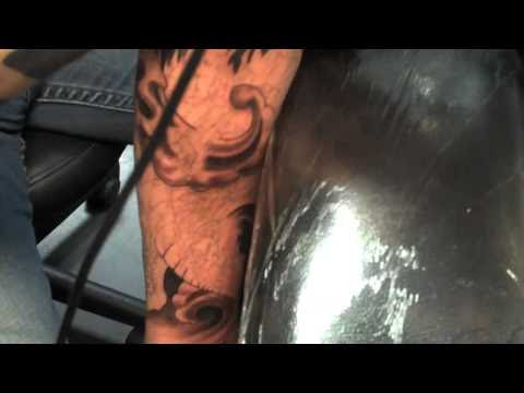 a Japanese phoenix sleeve tattoo in progress by Terry Mayo owner of Cat a Japanese phoenix sleeve tattoo in progress by Terry Mayo owner of Cat