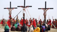 Filipino penitents are nailed to wooden crosses 