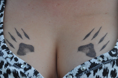Black Tattoos Design on Girl Chest