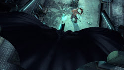 Batman gliding in on an enemy in 'Batman: Arkham Asylum'