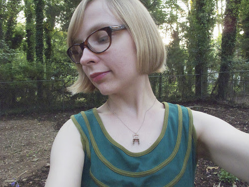 Tiny chair necklace.