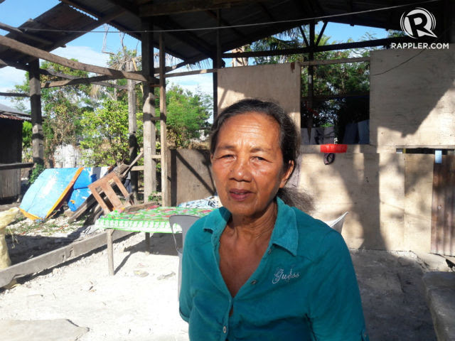 UNFINISHED. Prescilla Jumao-as stands in front of her house, which was constructed after Super Typhoon Yolanda struck in 2013. The house remains unfinished. 