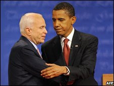 John McCain (left) stands with Barack Obama after their first debate on 26 September 