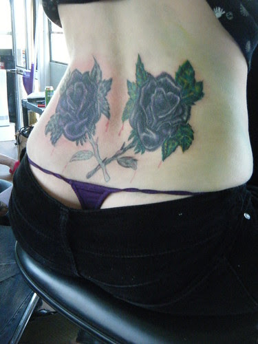 Flower Tattoo at Woman Backside 