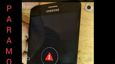(liquid or dust), it may not charge . SM-G610f J7 Prime Charging temperature symbol Solution