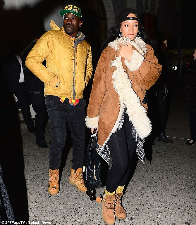 Hot date? Rihanna stepped out for dinner in New York on Friday with a handsome mystery man 