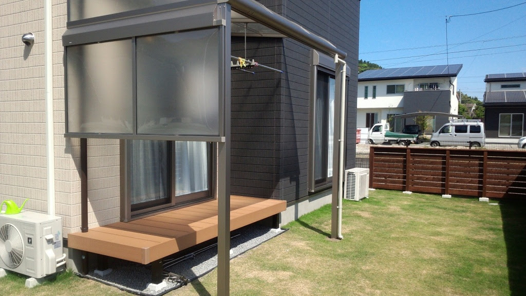 横からの雨風を防ぐ快適な洗濯物干し場 屋根テラス デッキ工事 姶良