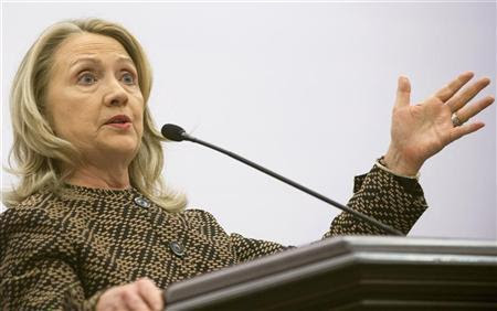 U.S. Secretary of State Hillary Clinton gestures during a joint news conference with the Turkish Foreign Minister Ahmet Davutoglu (unseen) during the Global Counterterrorism Forum in Istanbul June 7, 2012. REUTERS/Saul Loeb/Pool