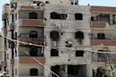 Vista general de un edificio destruido dentro de la zona bajo dominio rebelde de al-Moadhamiyah, en las afueras de Damasco (Siria). EFE/Archivo