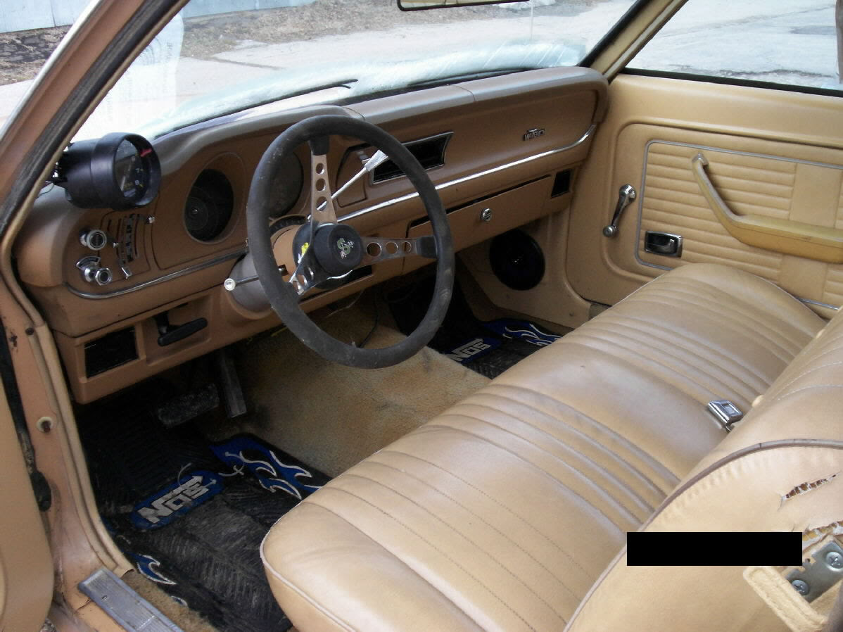Butterscotch color, tan vinyl interior, small V-8, auto, 2 ...
