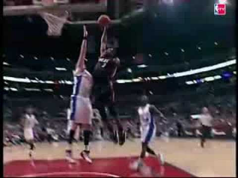 dwyane wade dunking on someone. Dwyane Wade dunks over Kaman