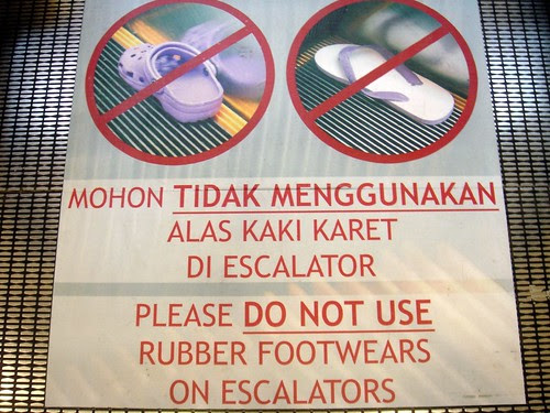 Croc escalator sign in Jakarta by satya.w