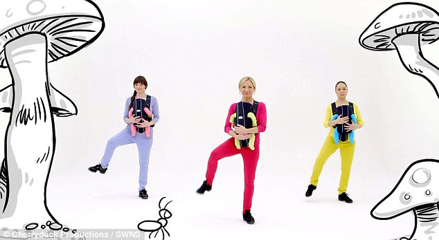 Dance it off: The world's first exercise DVD where mums can workout while strapped to their baby has been released