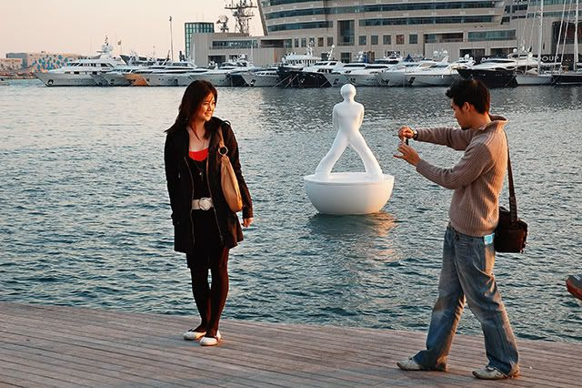 Taking Photographs at Port Vell, Barcelona: Romantic Couple [enlarge]