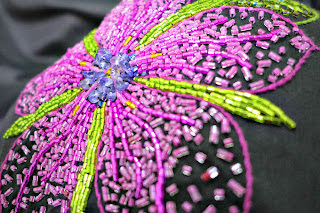 pocket with beaded embroidery