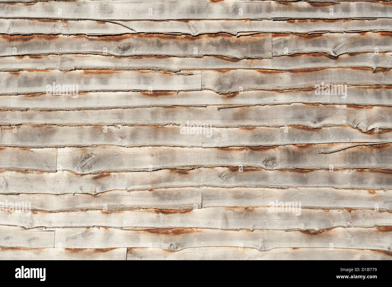 Shiplap planks of wood on the side of a barn. A potential ...