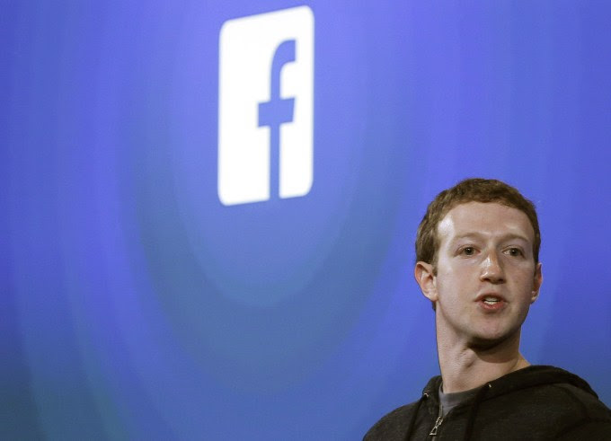 Facebook CEO Mark Zuckerberg speaks at the company's headquarters in Menlo Park, Calif., Thursday, April 4, 2013. Zuckerberg says the company is not building a phone or an operating system. Rather, Facebook is introducing a new experience for Android phones. The idea behind the new Home service is to bring content right to you, rather than require people to check apps on the device. (AP Photo/Marcio Jose Sanchez)