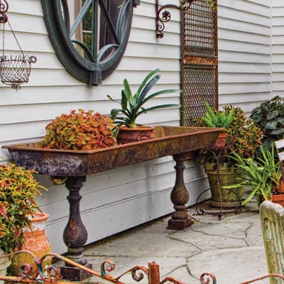 a patio with planters