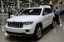 A 2011 all-new production Jeep Grand Cherokee sits inside the atrium of the new body shop at the Jefferson North Assembly Plant in Detroit,