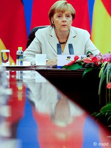 German Chancellor Angela Merkel holds a bilateral talks with Chinese Premier Wen Jiabao, unseen, inside the Great Hall of the People in Beijing Thursday, Aug. 30, 2012. Merkel is on a two-day official visit to China. (Foto:Diego Azubel, Pool/AP/dapd)